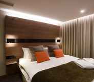 Kamar Tidur 4 Merit Kensington Hotel