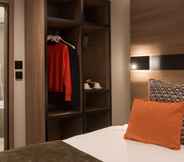 Kamar Tidur 5 Merit Kensington Hotel