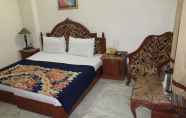 Bedroom 7 Hotel Sunstar Residency