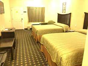 Kamar Tidur 4 Homegate Inn and Suites
