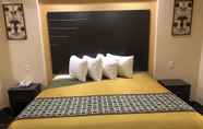 Kamar Tidur 7 Homegate Inn and Suites