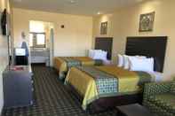 Kamar Tidur Homegate Inn and Suites