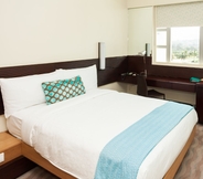 Kamar Tidur 4 Suncoast Hotel & Towers