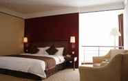 Bedroom 7 Days Hotel & Suites by Wyndham Jiaozuo