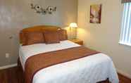 Bedroom 5 Affordable Corporate Suites - Lynchburg