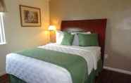 Bedroom 6 Affordable Corporate Suites - Lynchburg