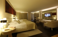 ห้องนอน 6 Charisma De Luxe Hotel