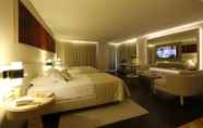 Bedroom 6 Charisma De Luxe Hotel