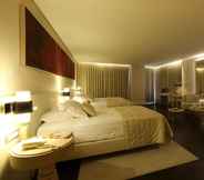 Bilik Tidur 6 Charisma De Luxe Hotel