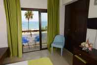 Bedroom Les Palmiers Beach Hotel