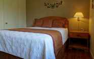 Bedroom 4 Affordable Corporate Suites - Lanford