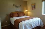 Bedroom 5 Affordable Corporate Suites - Lanford