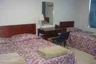 Kamar Tidur New World Hotel