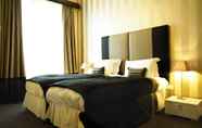 Kamar Tidur 4 Kensington House Aparthotel