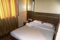 Phòng ngủ Hotel Rajvikas Residency