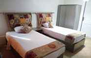 Kamar Tidur 2 Invitation Hotel