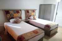 Kamar Tidur Invitation Hotel