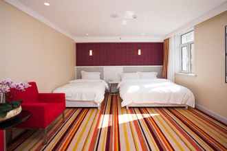 Bedroom 4 Dalian Spring Hotel