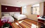 Bedroom 4 Dalian Spring Hotel