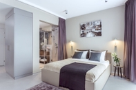 Bedroom VISIONAPARTMENTS St. Sulpice Route de Vallaire