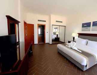 Kamar Tidur 2 Savanna Empire Hotel and Resort Spa