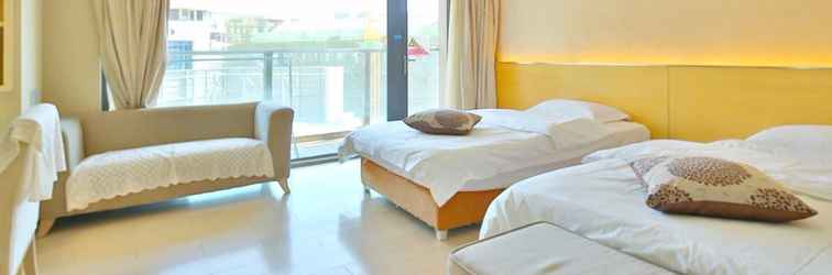 Kamar Tidur Hailan Sea View Holiday Apart-hotel