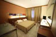 ห้องนอน Hotel Artemide