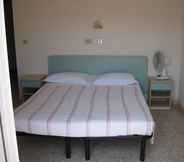 Kamar Tidur 5 Hotel Montecarlo Nord