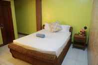 ห้องนอน Centillo Travellers Inn