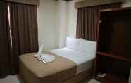 Kamar Tidur 7 Candice Lucy Hotel