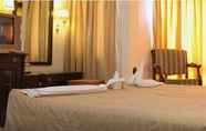 Bedroom 6 Swosti Palm Resorts
