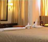 Bedroom 6 Swosti Palm Resorts