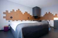 Bedroom Hotel Rebstock by b_smart
