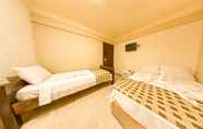 Kamar Tidur 7 Ados Hotel