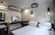 Kamar Tidur 4 ELseWhere-LeiFu Hotel