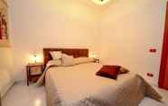 Bedroom 3 Rentopolis - Villa Magnolie