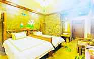 Bedroom 6 Dielianhua Cowherd Inn Zhangjiajie