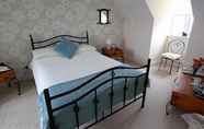 Kamar Tidur 3 Sunset Bed and Breakfast