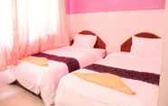 Kamar Tidur 6 Capitol 3 Guesthouse