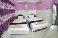 Kamar Tidur Capitol 3 Guesthouse