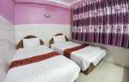 Kamar Tidur 7 Capitol 3 Guesthouse