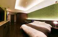 Kamar Tidur 4 Hotel Lotus Toyonaka - Adults Only