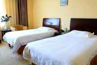 Bilik Tidur Greentree Inn Suzhou Taicang Baolong Square Express Hotel