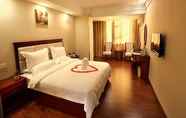 Bedroom 2 GreenTree Inn SanYa Jiyang Dist YaLongWan YingBin Ave Hotel