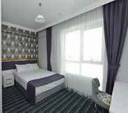 ห้องนอน 3 Grand Surmely Business Hotel
