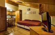 Kamar Tidur 2 Chalet Stelle di Neve