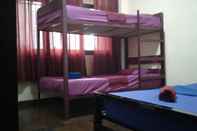 Bedroom Yaya Guesthouse - Hostel