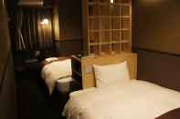 ห้องนอน Hotel SUI Ginza Kyobashi by ABEST