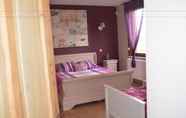 Kamar Tidur 6 Cozy Holiday Home in Ploegsteert With a Garden