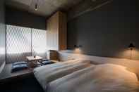 Bedroom KUMU Kanazawa by The Share Hotels